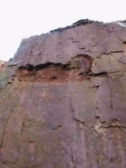 Gritstone quarry face - freestone below, chemical weathering above