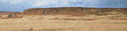 White Edge in winter.  Heather at the top of the slope shows as dark brown.  Braken which needs a damp soil but cannot grow in water logged areas grows on gentle slopes and shows as red-brown.  Grasses and rushes, adapted to the wet conditions on the near flat areas show as creamy brown.